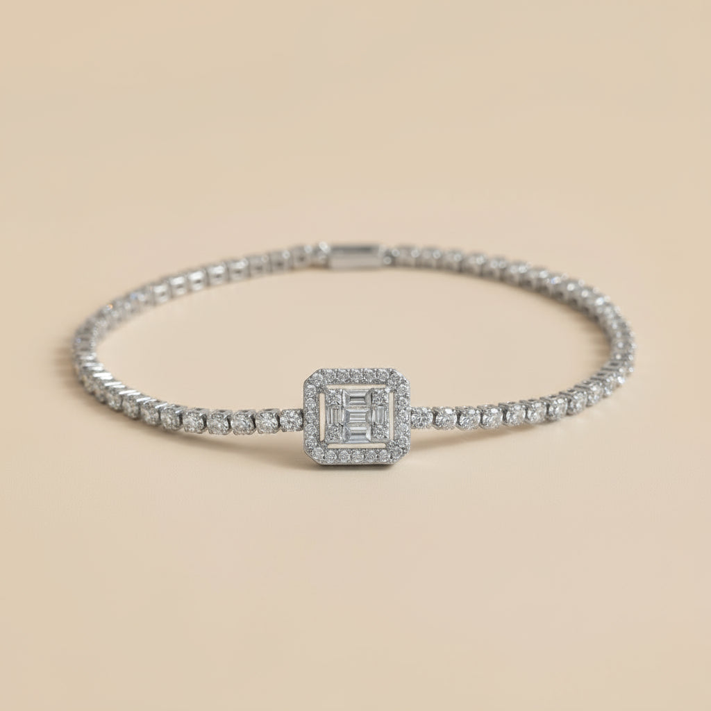 Silver bracelet with diamond accents on a beige background