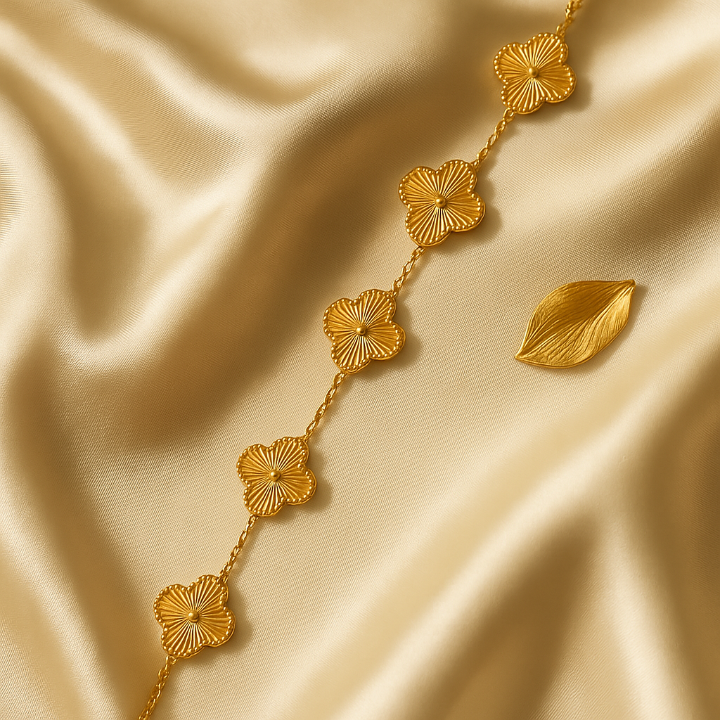 Gold Clover Bracelet on a satin background