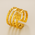 Hammered Stacks Ring on a beige background
