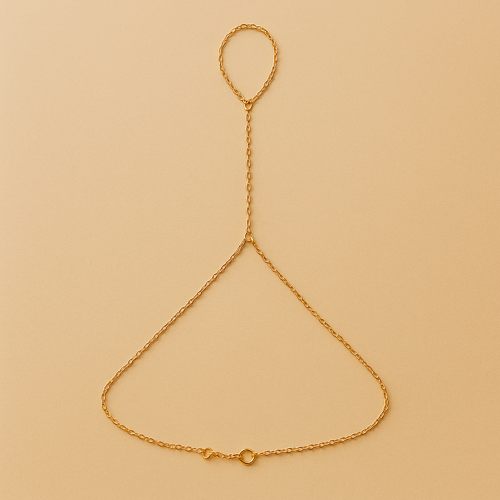 Gold Handchain on a beige background