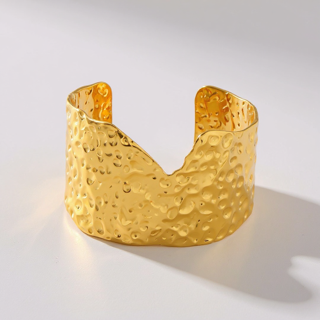 Molten Edge Bangle on a light gray background