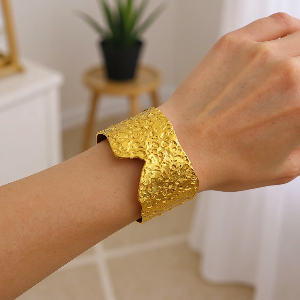 Molten Edge Bangle on a wrist with a blurred indoor background