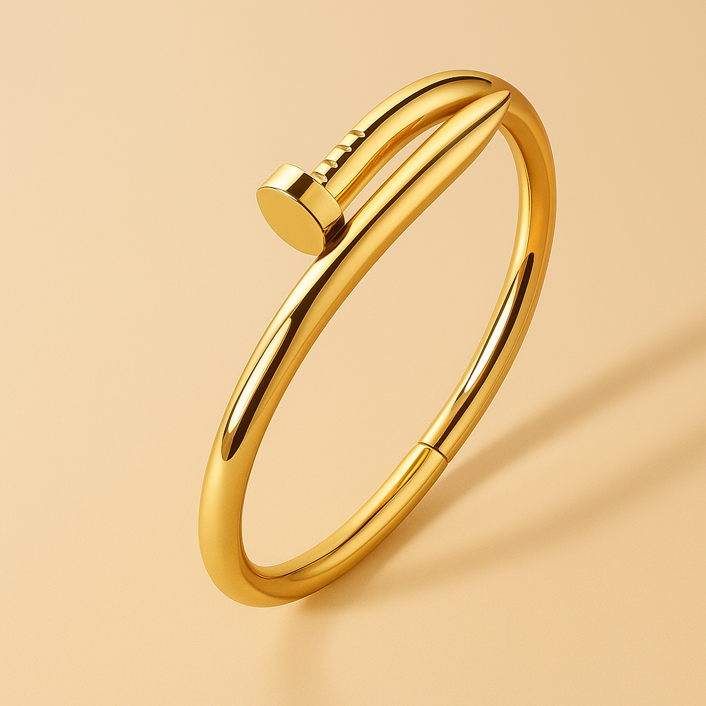 Gold bracelet on a beige background