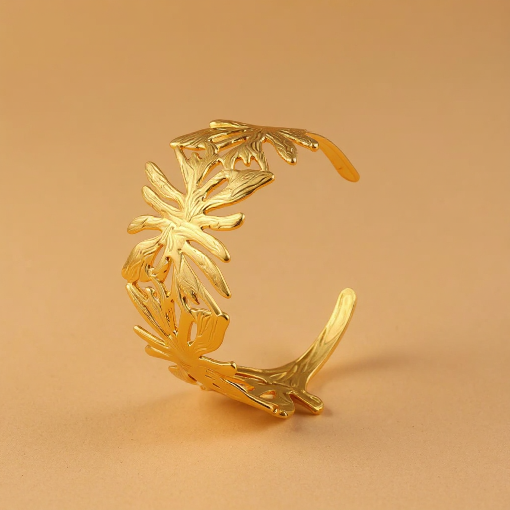 Gold Palm Breeze Bangle on a beige background