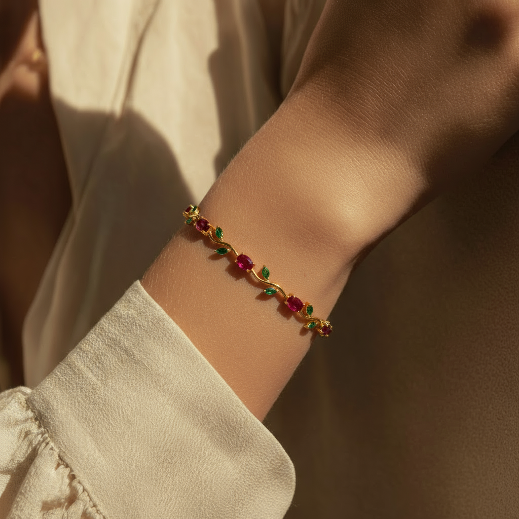 Person wearing a bracelet with red and green beads.