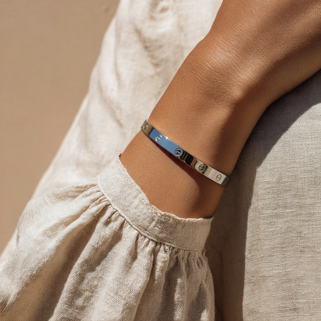 Woman wearing the silver Signature Screw Bracelet