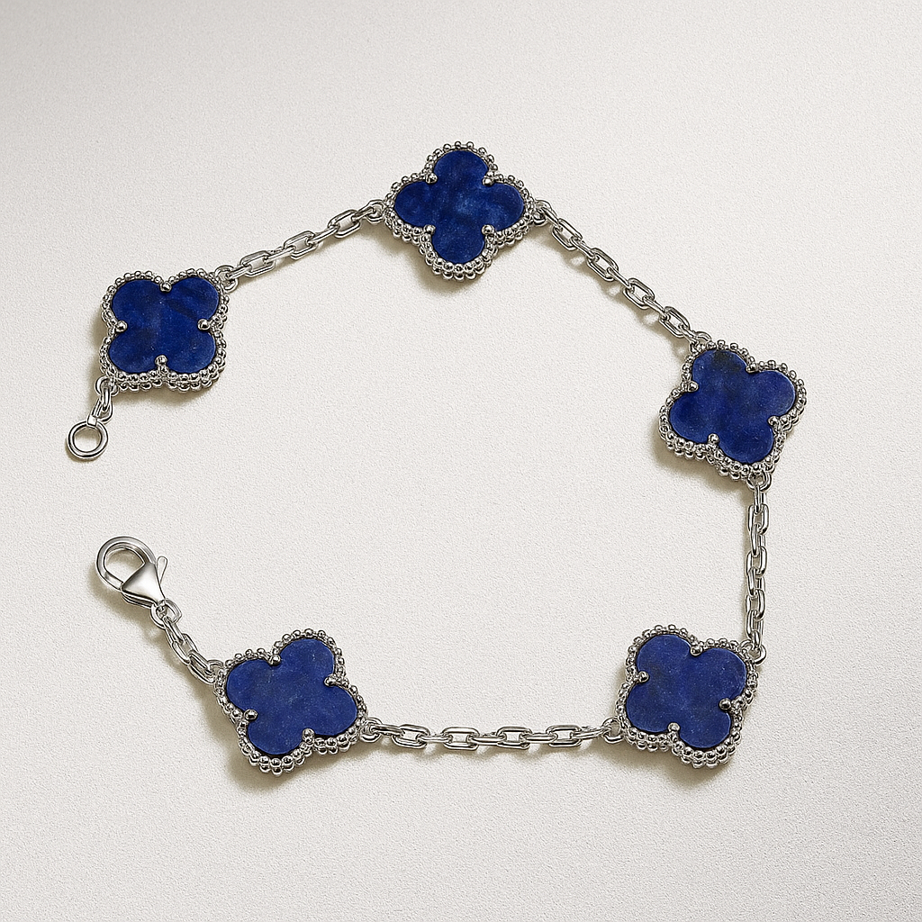 Silver Bracelet with blue clover-shaped links on a white background