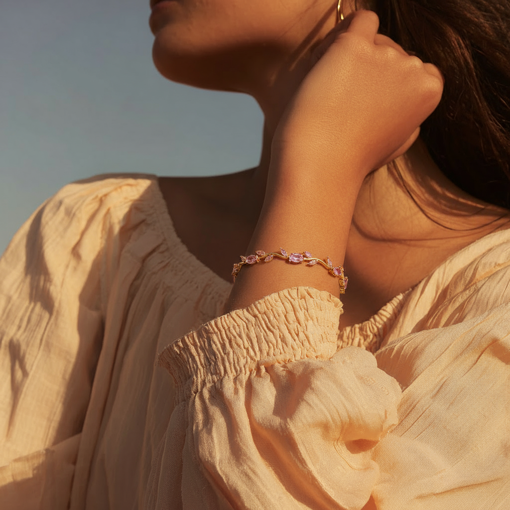 Woman wearing a Soft Rose Blossom Bracelet with a blurred background