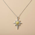 Star-shaped pendant necklace on a beige background