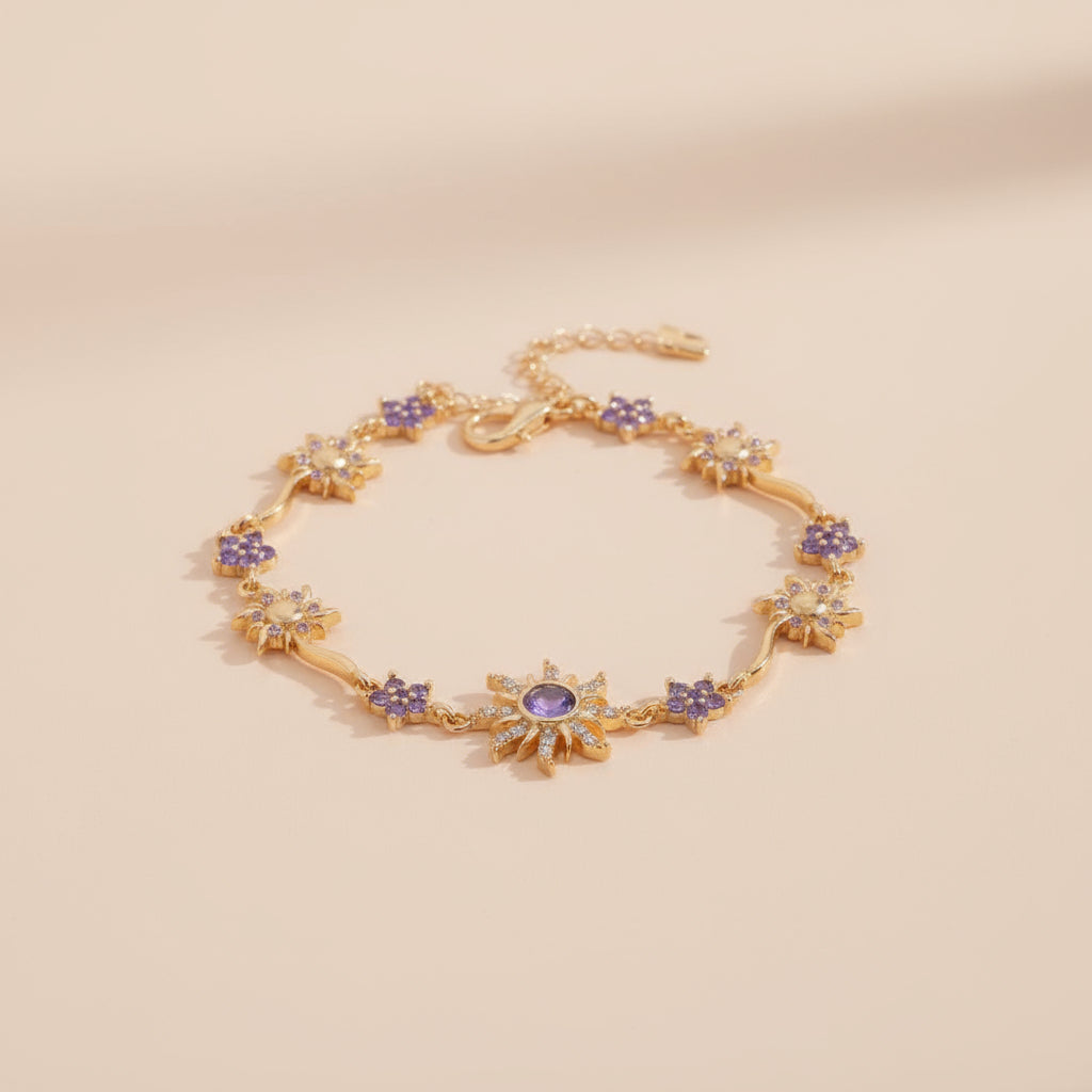 Gold bracelet with purple stones on a beige background