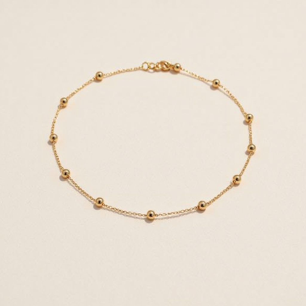 Golden Beaded Necklace with small beads on a beige background