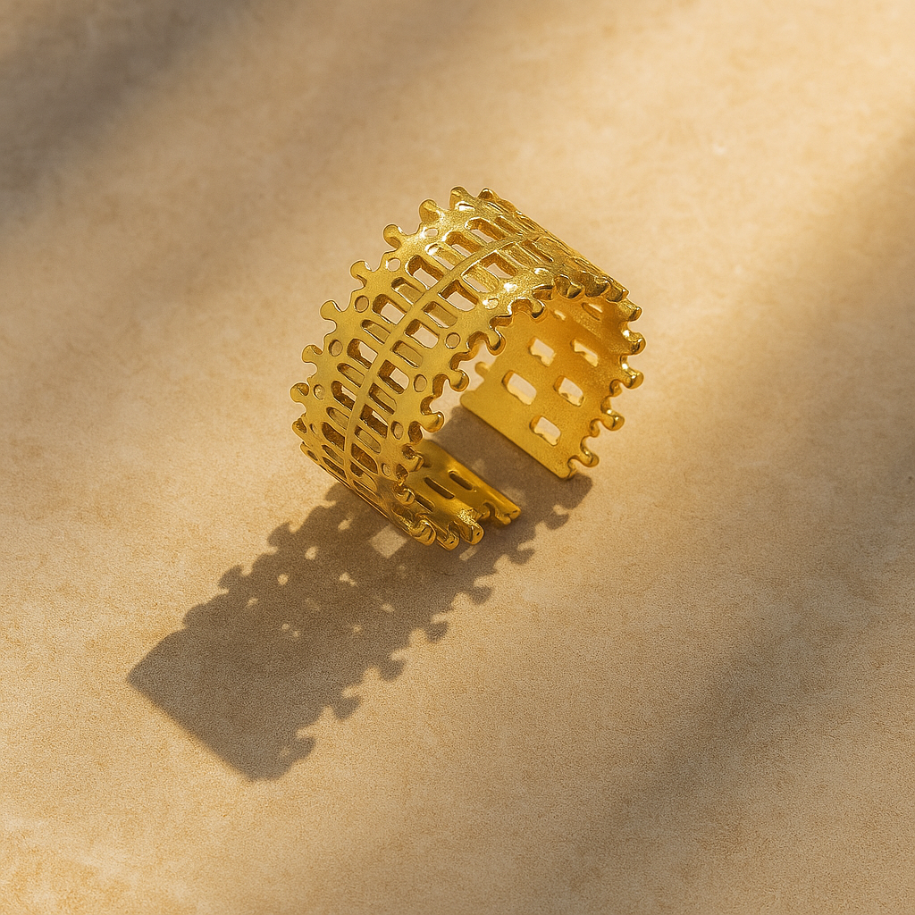 wide shot of Lattice Gold Ring on a beige background
